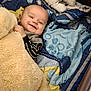 James joined the competition — help win amazing prizes! baby, bed, blanket, child, comfort, cozy, crib, cushion, cute, happy, home, indoor, infant, plush_toy, relaxed, sleeping_area, smiling, soft, stuffed_animal, toddler