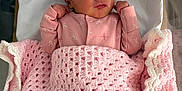 Elsi-Mae joined the competition — help win amazing prizes! newborn, baby, sleeping, pink_blanket, pink_outfit, hospital_bassinet, white_sheet, infant, cozy, cute, peaceful, small_hands, face, closed_eyes, indoor, soft_texture, crochet_blanket, portrait, child, resting
