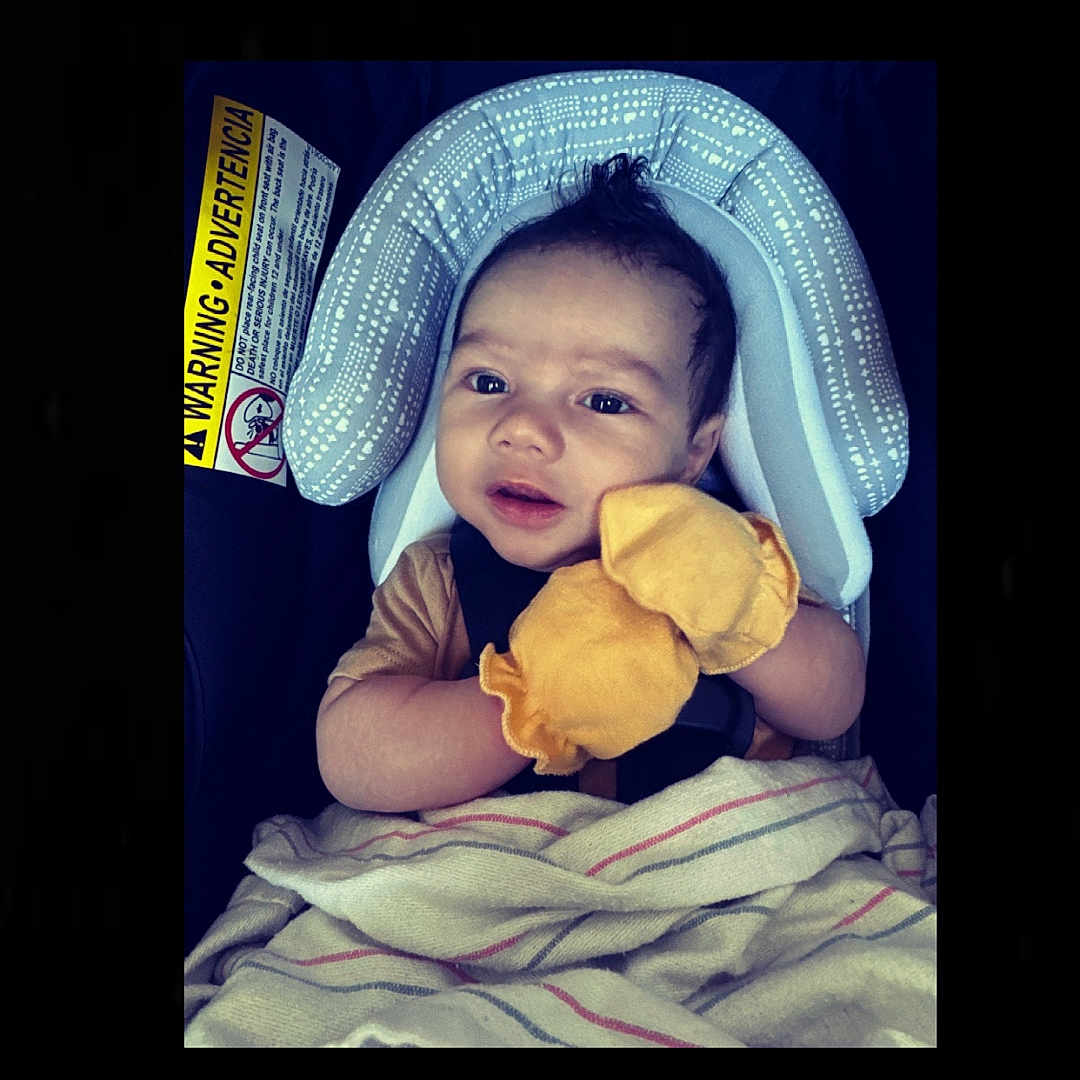 Zyon joined the competition — help win amazing prizes! baby, blanket, car_seat, child, clothing, comfort, cute, expression, face, headrest, indoor, infant, looking, mittens, person, portrait, safety, seatbelt, toddler, young_child