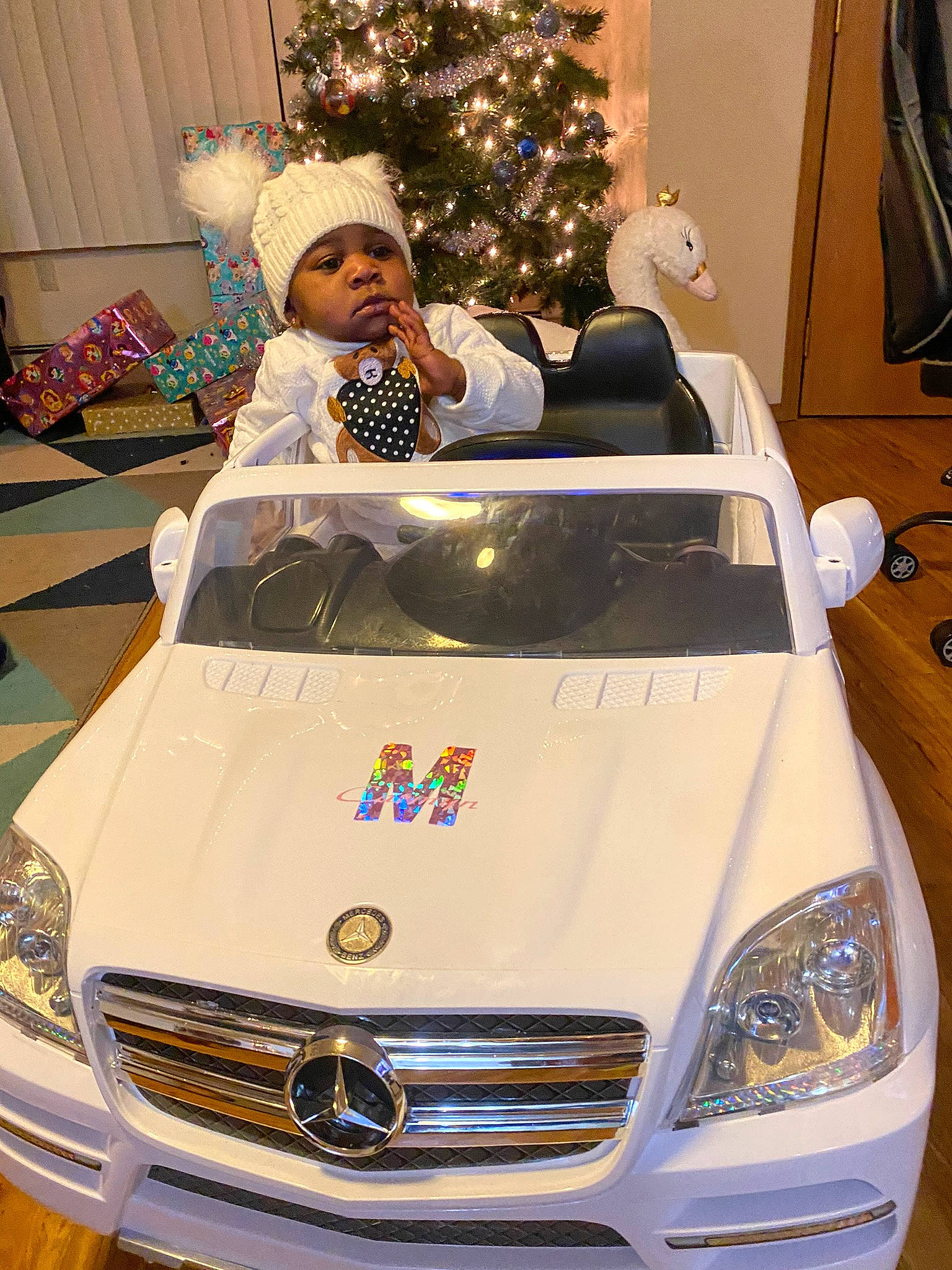 Carmyn joined the competition — help win amazing prizes! automotive_design, automotive_exterior, automotive_lighting, bumper, car, christmas_tree, grille, headlamp, headwear, hood, land_vehicle, light, mode_of_transport, motor_vehicle, person, personal_luxury_car, photograph, tire, vehicle, vehicle_registration_plate