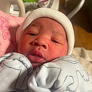 Eiress joined the competition — help win amazing prizes! architecture, baby, beanie, blanket, bonnet, building, cap, clothing, face, furniture, glove, hat, head, hospital, newborn, person, photography, portrait, quilt, sleeping