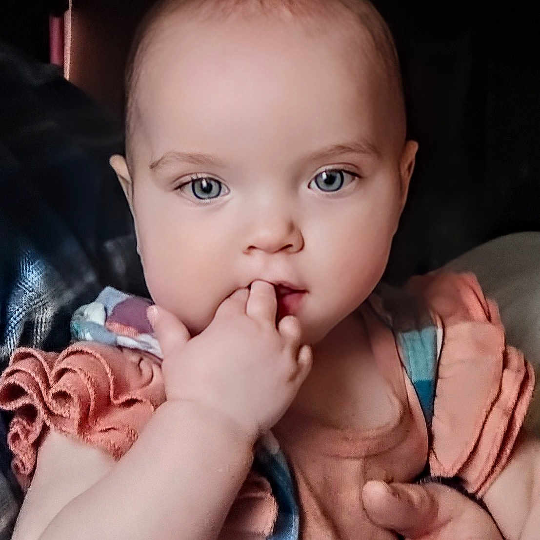 Nova joined the competition — help win amazing prizes! arm, baby, biting, bodypart, clothing, couch, eating, face, finger, food, furniture, hand, happy, head, newborn, person, photography, portrait, sitting, smile