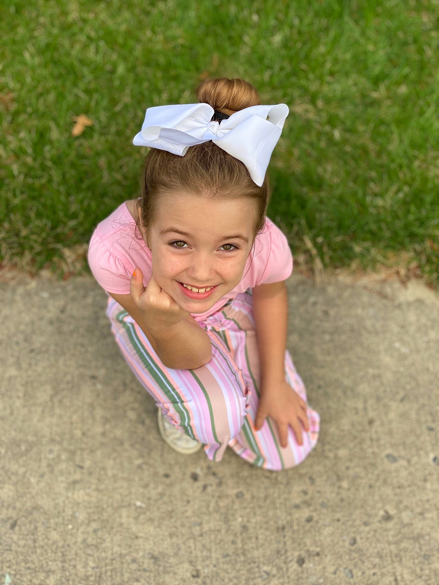 Carleigh joined the competition — help win amazing prizes! baby, child, ear, facial_expression, fun, grass, hair_accessory, happy, headband, joy, person, pink, plant, play, smile, summer, toddler, vacation