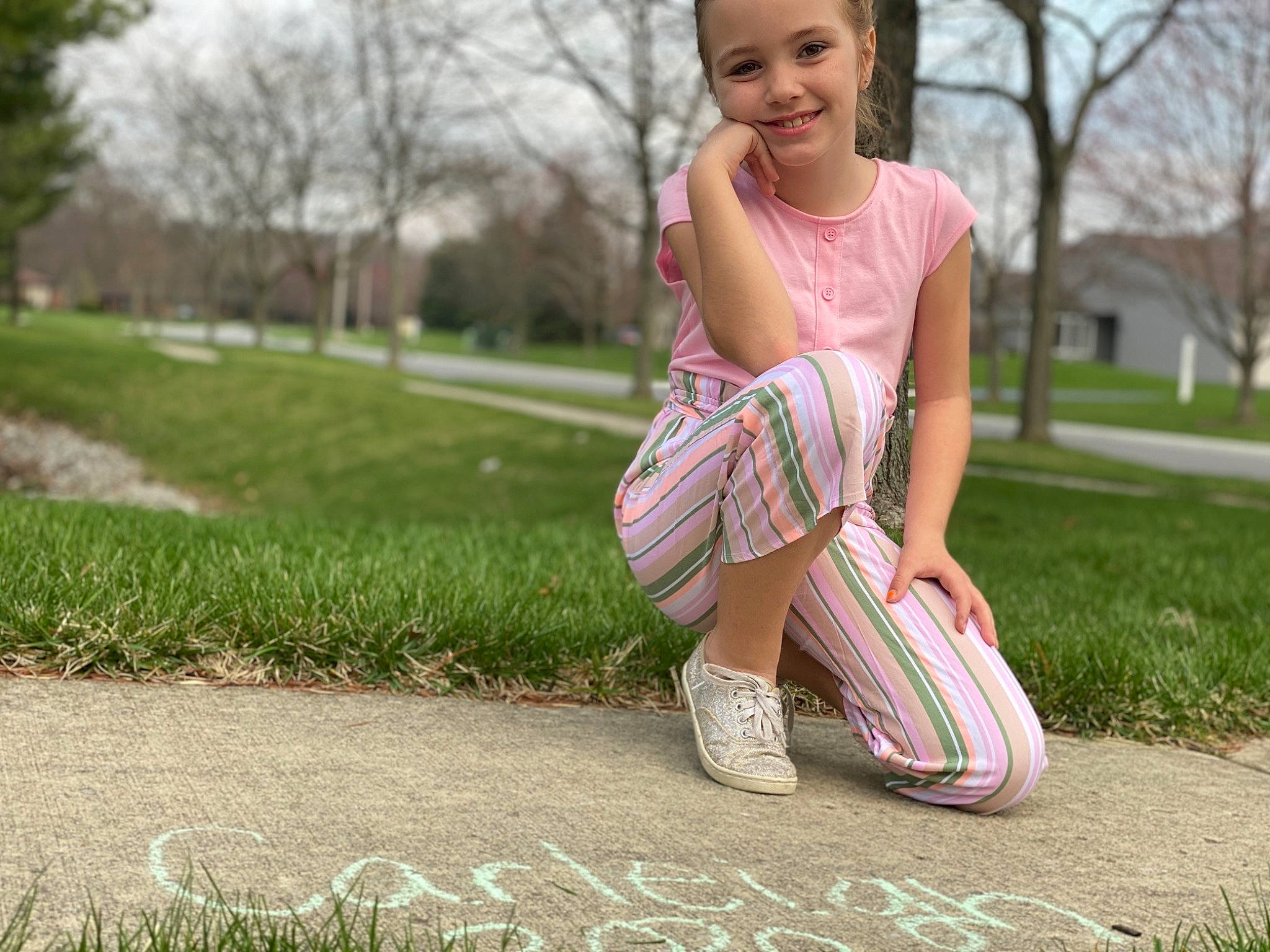 Carleigh joined the competition — help win amazing prizes! ankle, child, child_model, design, dress, fashion, footwear, grass, joy, knee, leg, pattern, person, pink, play, sandal, shoe, sitting, spring, street_fashion
