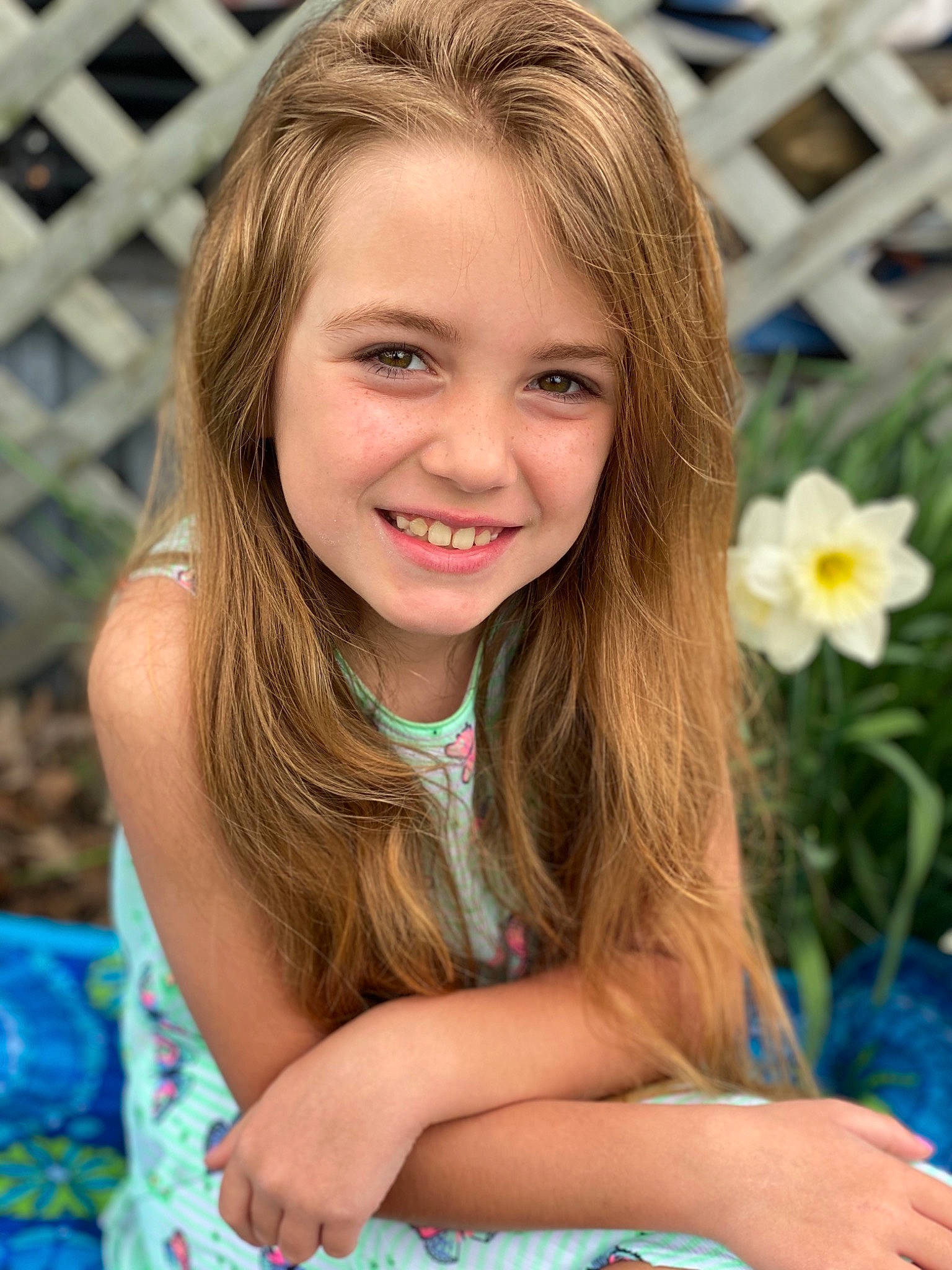 Carleigh joined the competition — help win amazing prizes! beauty, blond, brown_hair, child, child_model, face, fawn, flower, fun, hair, hairstyle, happy, iris, joy, long_hair, person, photography, plant, sitting, smile