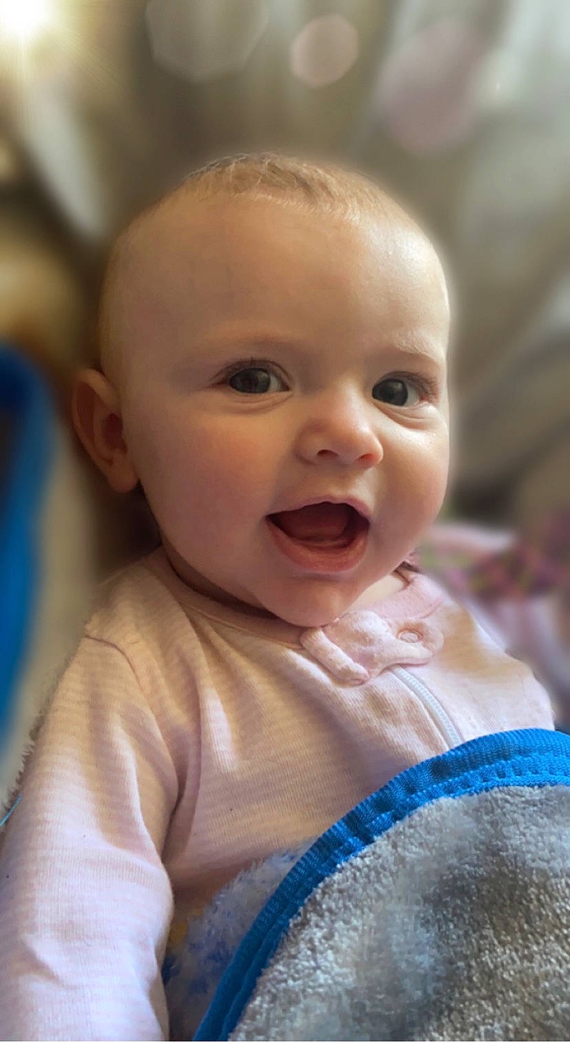 Lilliana joined the competition — help win amazing prizes! baby, baby_toddler_clothing, blue, cheek, dress, eye, eyebrow, eyelash, hair, happy, head, human_body, iris, lip, mouth, nose, person, skin, sleeve, smile