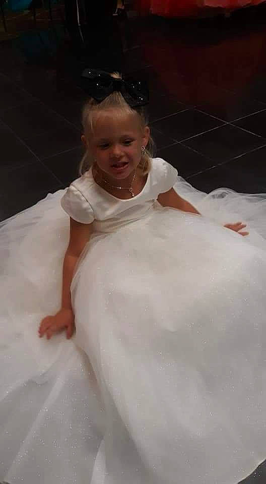 Teigan joined the competition — help win amazing prizes! bridal_clothing, child, dress, gown, person, smile, wedding_dress, white