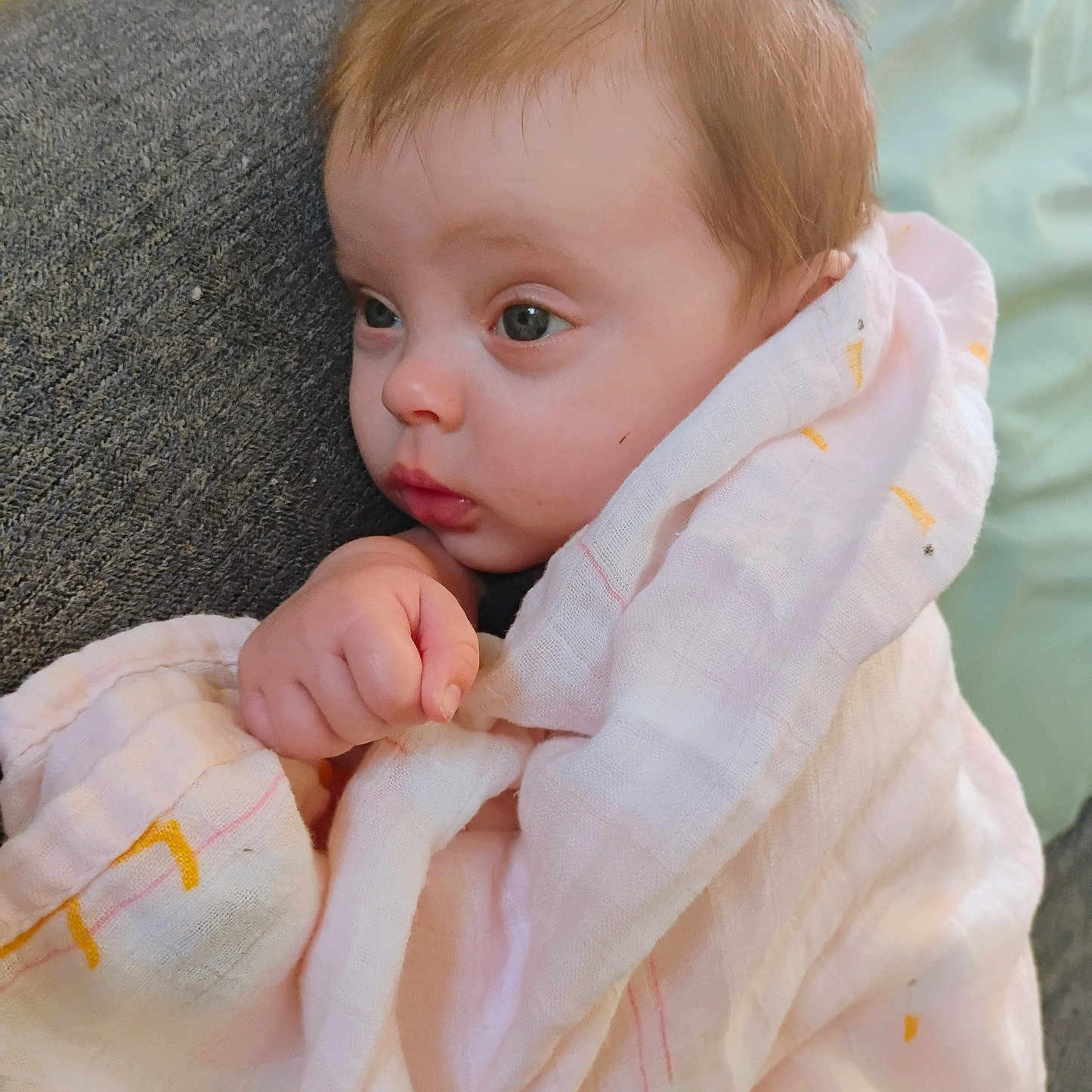Olivia joined the competition — help win amazing prizes! baby, blanket, blonde, bodypart, couch, cushion, face, finger, furniture, hand, happy, head, homedecor, newborn, person, photography, portrait, quilt, smile, towel