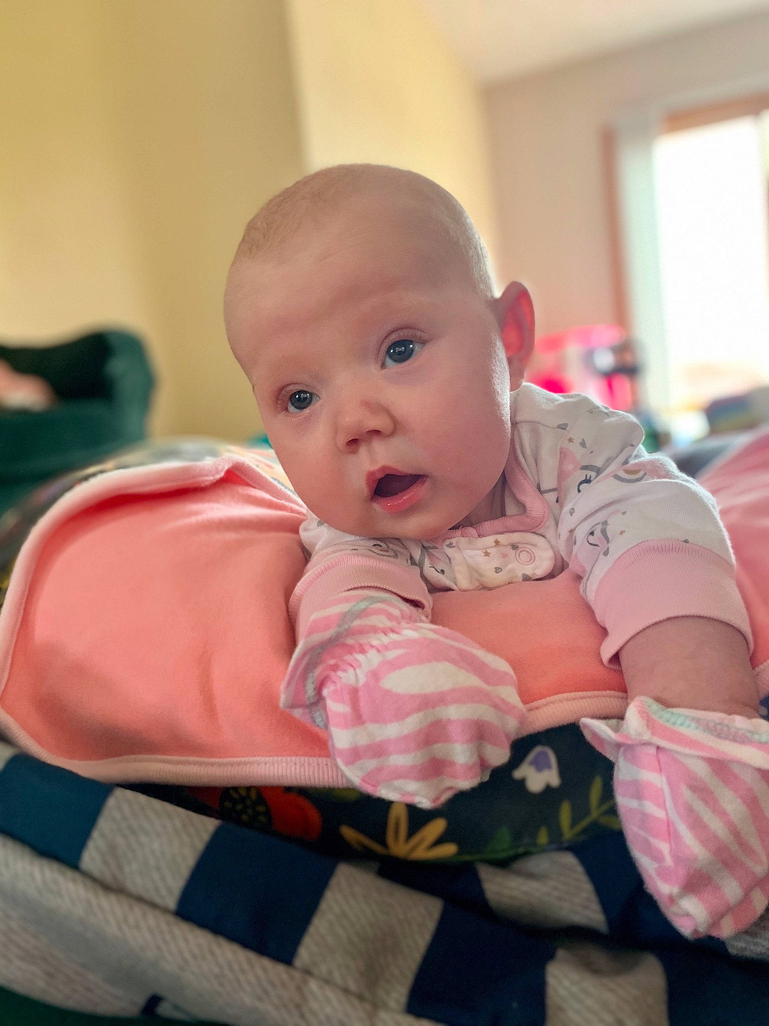 Kadence is registered to the contest to win money with this photo: baby, baby_products, baby_safety, baby_toddler_clothing, carmine, cheek, child, comfort, eye, flooring, fun, happy, iris, linens, pattern, person, room, sitting, skin, sleeve