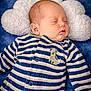Weston joined the competition — help win amazing prizes! baby, sleeping, striped_clothing, onesie, blue, white, pillow, soft_texture, infant, cute, peaceful, child, portrait, closeup, indoor, cozy, newborn, face, head, resting