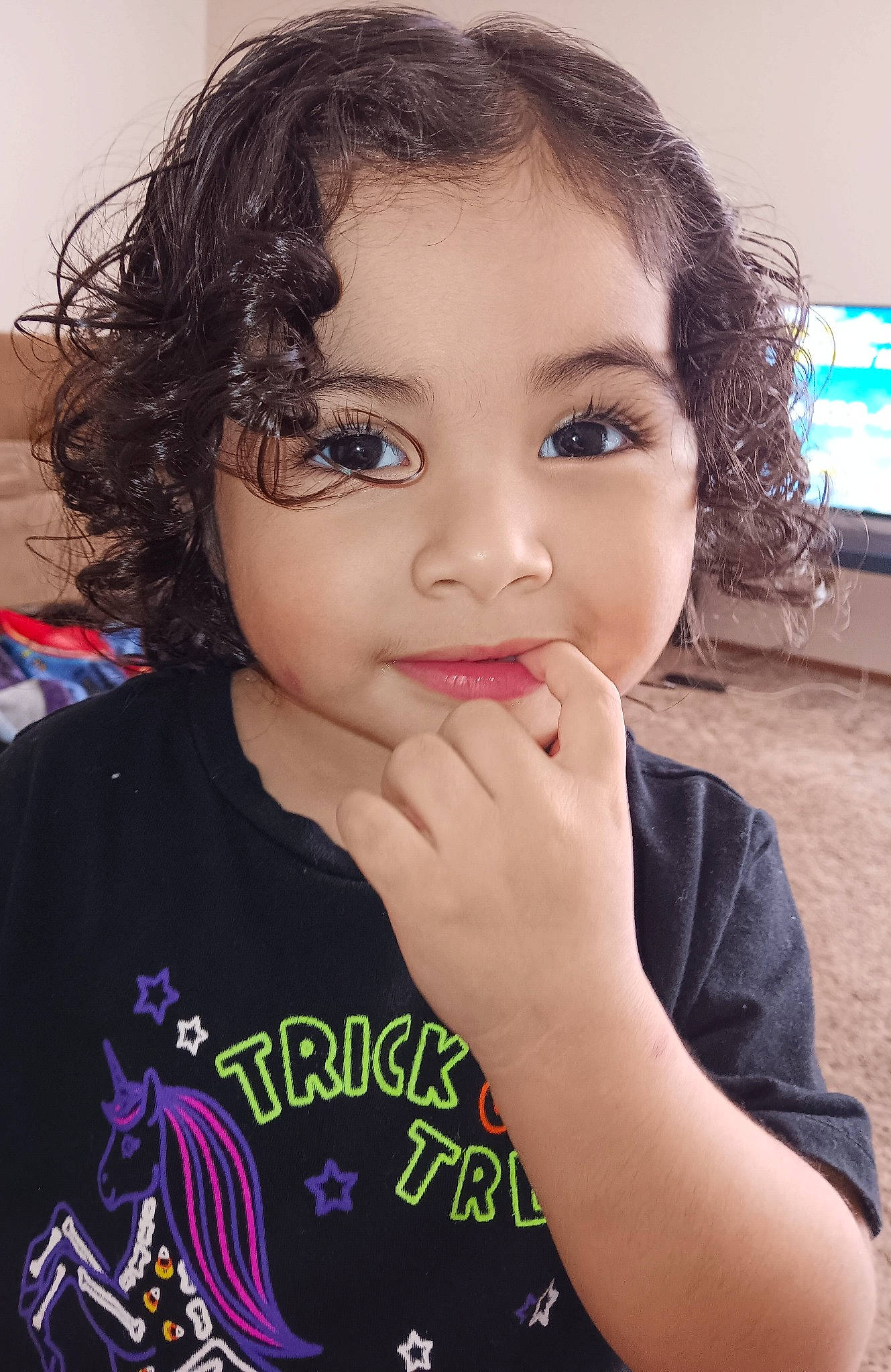 Daisy is registered to the contest to win money with this photo: black_hair, cheek, chin, cool, eyebrow, eyelash, facial_expression, forehead, fun, gesture, happy, human, iris, lip, mouth, neck, nose, person, skin, television