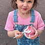Chelsea participe au concours pour gagner de l'argent avec cette photo : casual_clothing, child, cute, denim_overalls, dessert, food, girl, happy, holding, ice_cream, outdoor, pink_shirt, playful, smiling, sneakers, soft_serve, spoon, street, summer, young