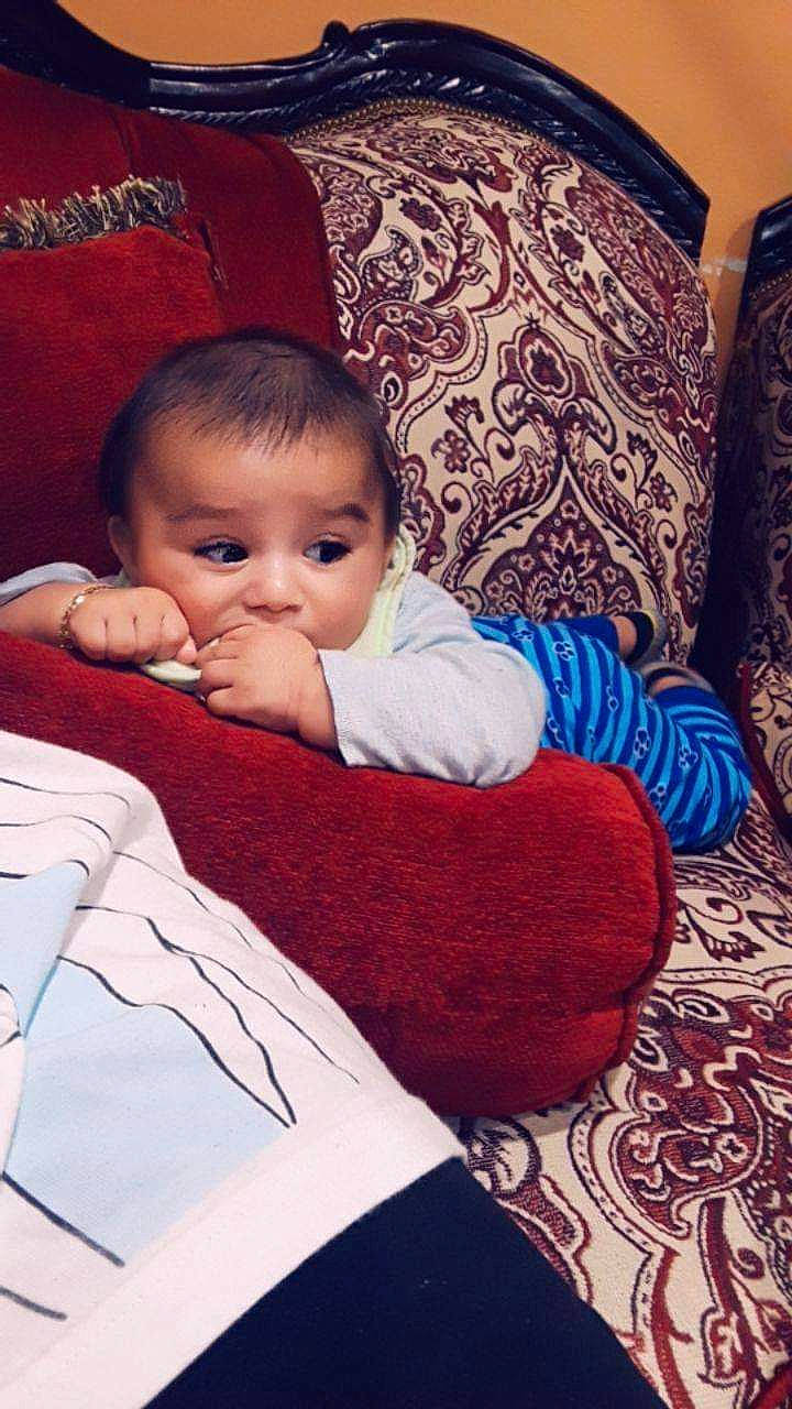 Isaias is registered to the contest to win money with this photo: baby, bedtime, cheek, child, comfort, joy, nap, person, sitting, skin, sleep, toddler