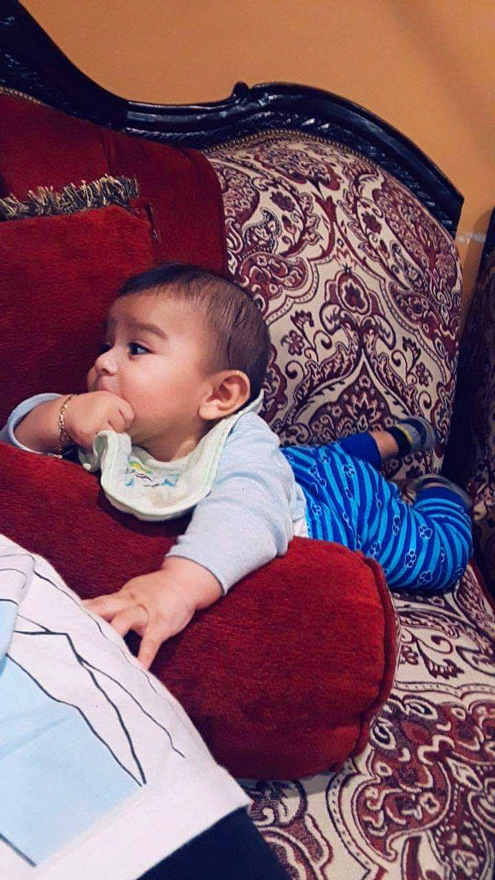 Isaias is registered to the contest to win money with this photo: arm, baby, cheek, child, comfort, mouth, person, sitting, toddler