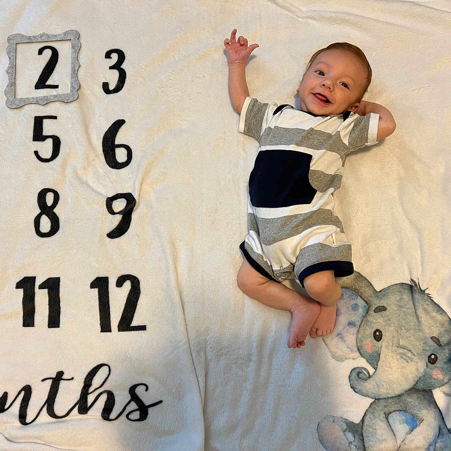 Atlus joined the competition — help win amazing prizes! baby, bed, blanket, bodypart, clothing, crib, face, finger, furniture, hand, head, infantbed, newborn, number, person, photography, portrait, symbol, t_shirt, text
