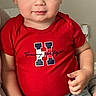 Lenox joined the competition — help win amazing prizes! adult_hand, baby, calm, child, closeup, clothing, couch, eyes, face, gray_pants, home, indoors, infant, person, photography, portrait, red_shirt, short_hair, sitting, smiling