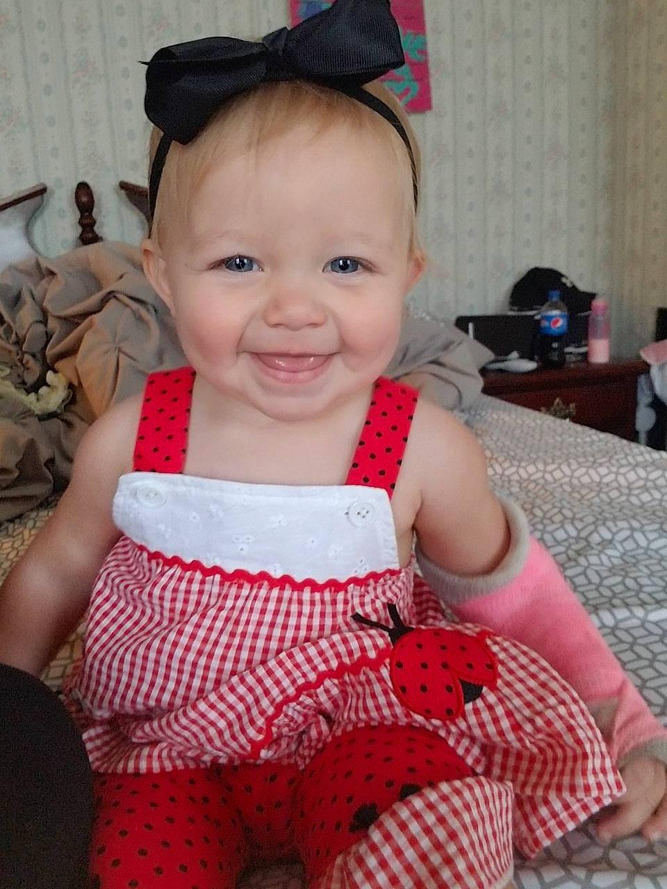 Adalyn is registered to the contest to win money with this photo: baby, baby_toddler_clothing, beauty, child, design, head, joy, pattern, person, pink, polka_dot, sitting, skin, smile, toddler