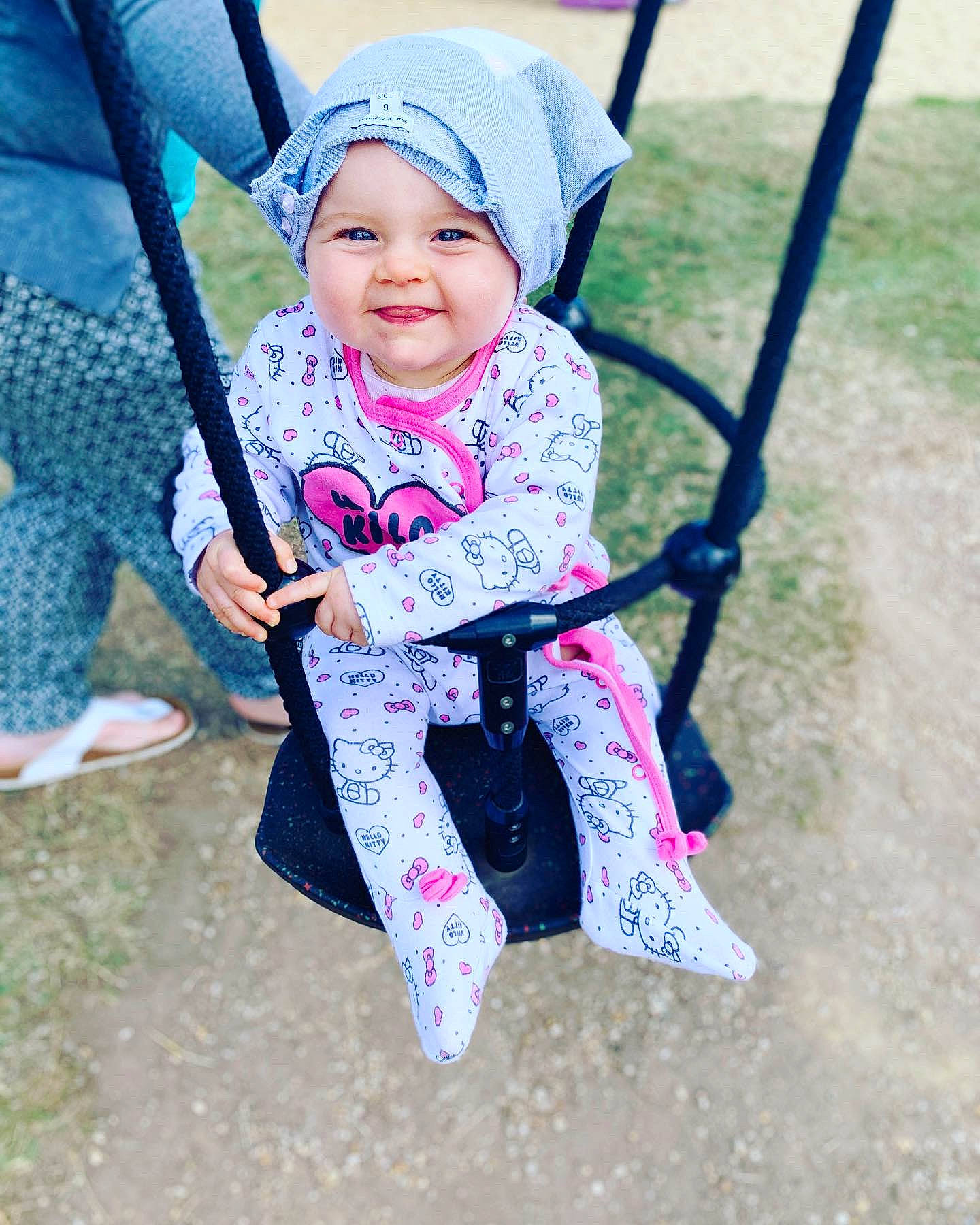 Elana participe au concours pour gagner de l'argent avec cette photo : baby, child, fun, happy, joy, outdoor_play_equipment, person, pink, play, playground, product, public_space, smile, swing, toddler