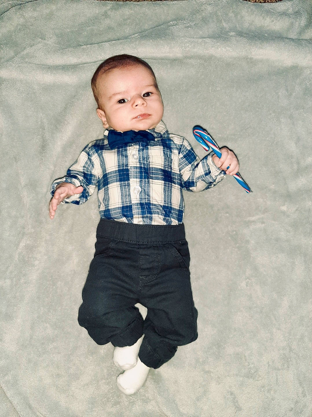 Julian is registered to the contest to win money with this photo: azure, baby_toddler_clothing, child, clothing, collar, cool, denim, dress_shirt, electric_blue, gesture, happy, outerwear, pattern, person, plaid, sleeve, standing, t_shirt, tartan, textile