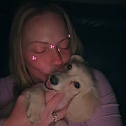 Aspen joined the competition — help win amazing prizes! woman, puppy, dog, face, hand, kiss, love, pet, cute, smile, indoor, dark, portrait, long_hair, clothing, sitting, holding, filter, butterfly, affection
