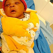 Jason a rejoint le concours — aidez-le/la à gagner de superbes lots ! architecture, baby, bed, blanket, bonnet, building, cap, clothing, face, furniture, glove, hat, head, hospital, newborn, person, photography, portrait, sleeping, towel