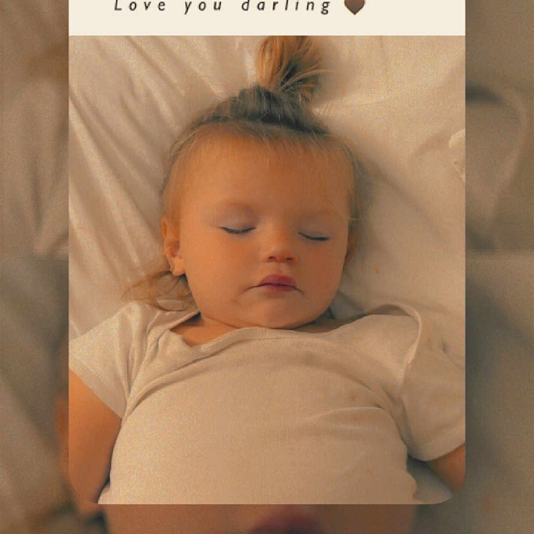 Alyssa joined the competition — help win amazing prizes! baby, bed, bedroom, blanket, cushion, electronics, face, furniture, head, homedecor, indoors, newborn, person, phone, photography, portrait, reading, room, sleeping, text