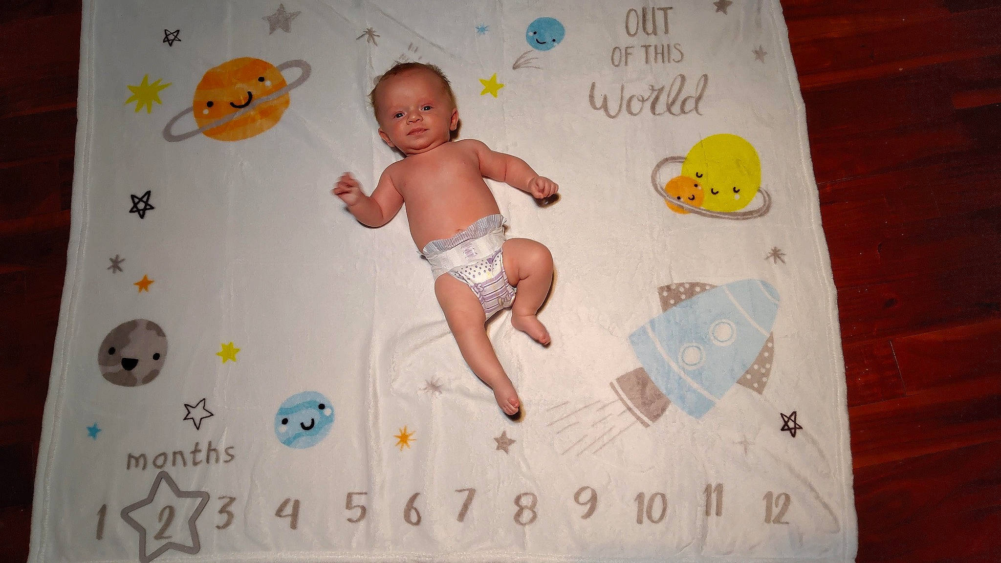 Lucian is registered to the contest to win money with this photo: art, baby, baby_products, baby_toddler_clothing, baby_toys, child, circle, font, fun, happy, illustration, paper, paper_product, pattern, person, rectangle, room, stomach, textile, toddler