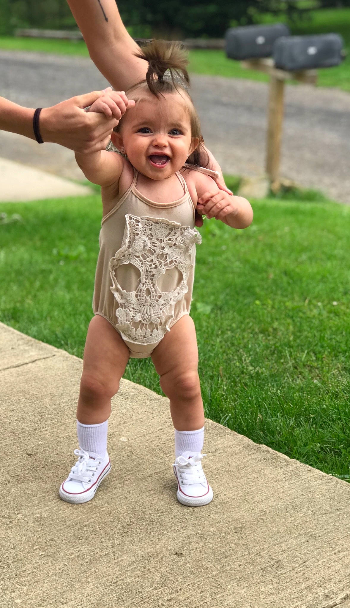 Briar Rose is registered to the contest to win money with this photo: arm, baby, child, fun, grass, happy, muscle, outdoor_play_equipment, person, plant, play, playground, smile, summer, swing, toddler, vacation