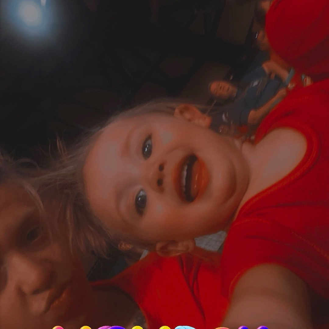 Emma is registered to the contest to win money with this photo: adult, baby, bodypart, clothing, face, female, happy, head, laughing, lighting, mouth, people, person, photography, portrait, selfie, smile, t_shirt, teeth, woman