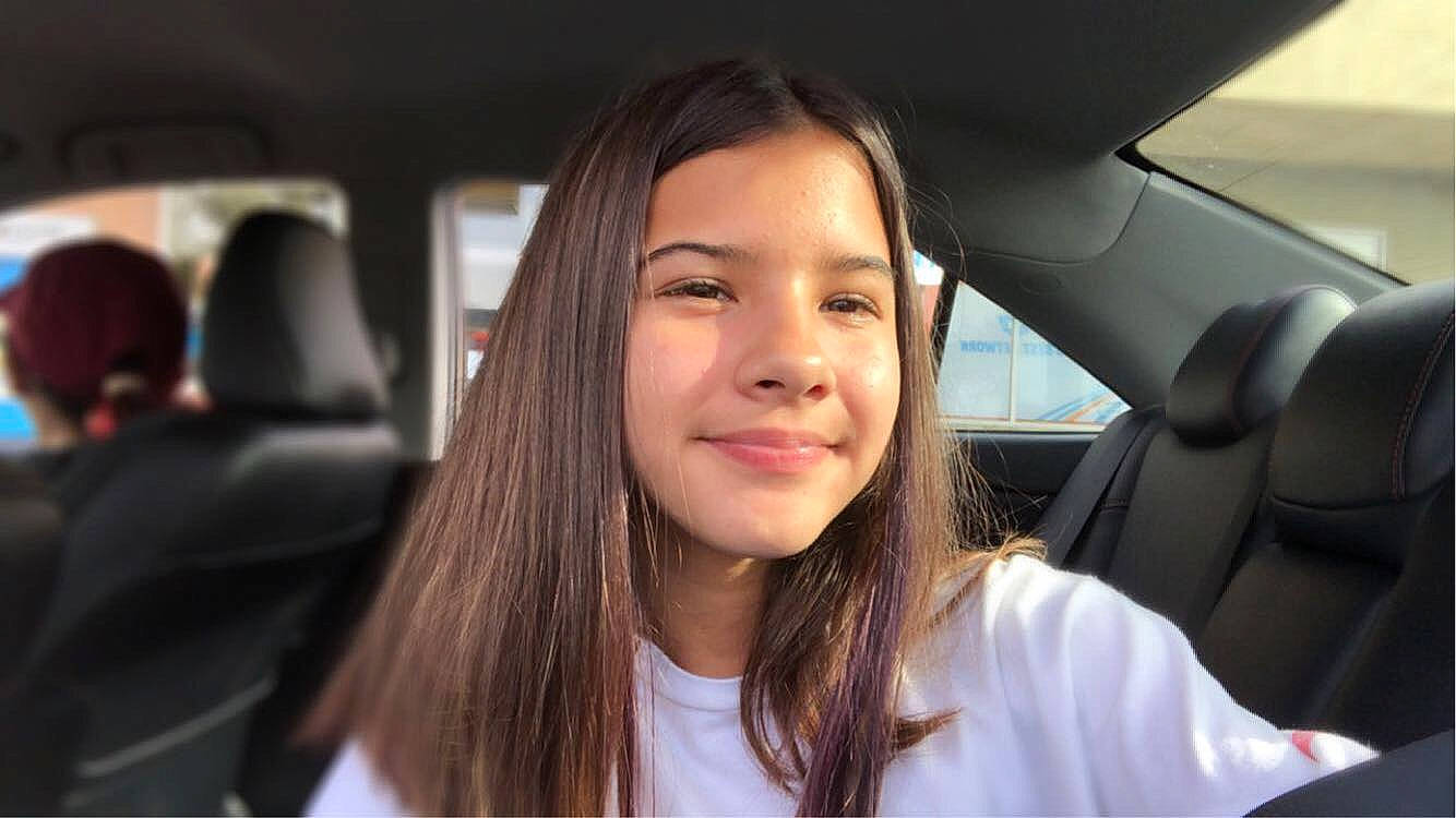 Destiney joined the competition — help win amazing prizes! beauty, black_hair, brown_hair, car, car_seat, chin, driving, eyebrow, face, forehead, hair, hairstyle, head, jaw, joy, lip, long_hair, luxury_vehicle, nose, person
