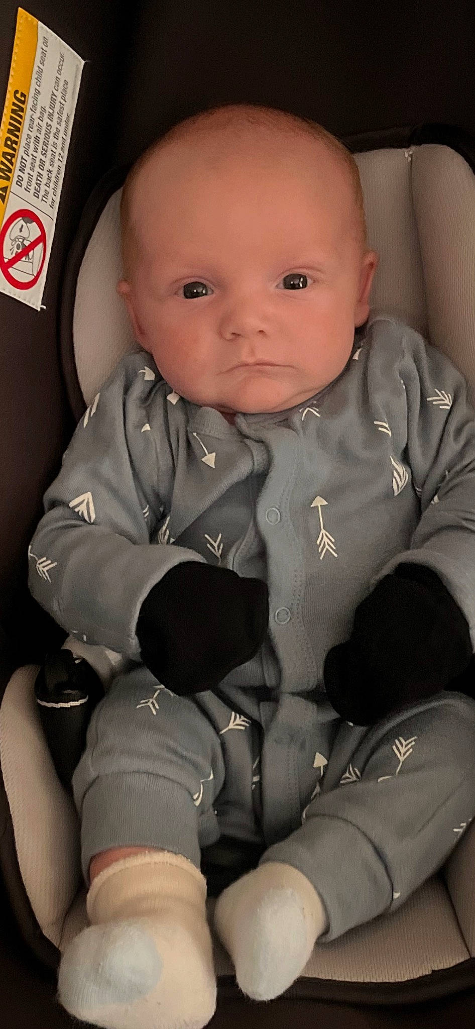 Levi is registered to the contest to win money with this photo: arm, baby, baby_in_car_seat, baby_products, baby_toddler_clothing, car_seat, cheek, child, collar, comfort, eye, finger, gesture, hairstyle, person, seat_belt, sitting, skin, sleeve, thumb