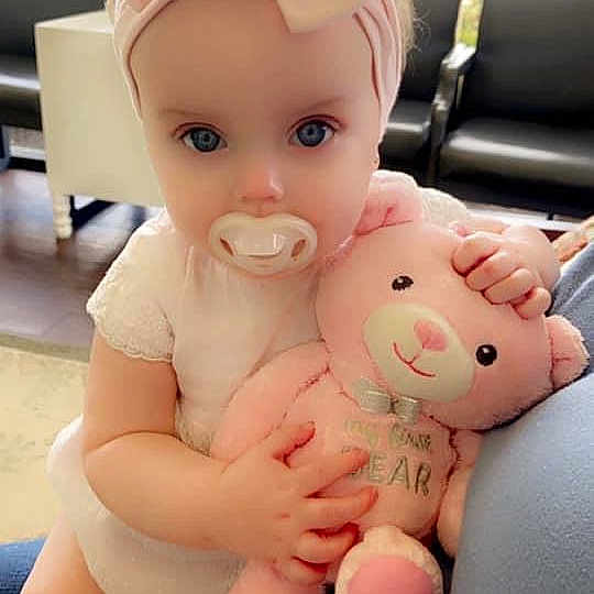 Harper-ann joined the competition — help win amazing prizes! cheek, child, facial_expression, finger, foot, gesture, happy, human_body, human_leg, mouth, nail, nose, pink, skin, stomach, stuffed_toy, thigh, thumb, toy, wrist