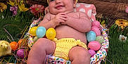 Hayzleigh is registered to the contest to win money with this photo: baby, basket, child, colorful, costume, crocheted_boots, crocheted_hat, cute, easter_eggs, flowers, grass, holiday, indoors, infant, playful, portrait, smiling, spring, wooden_background, yellow_chicks