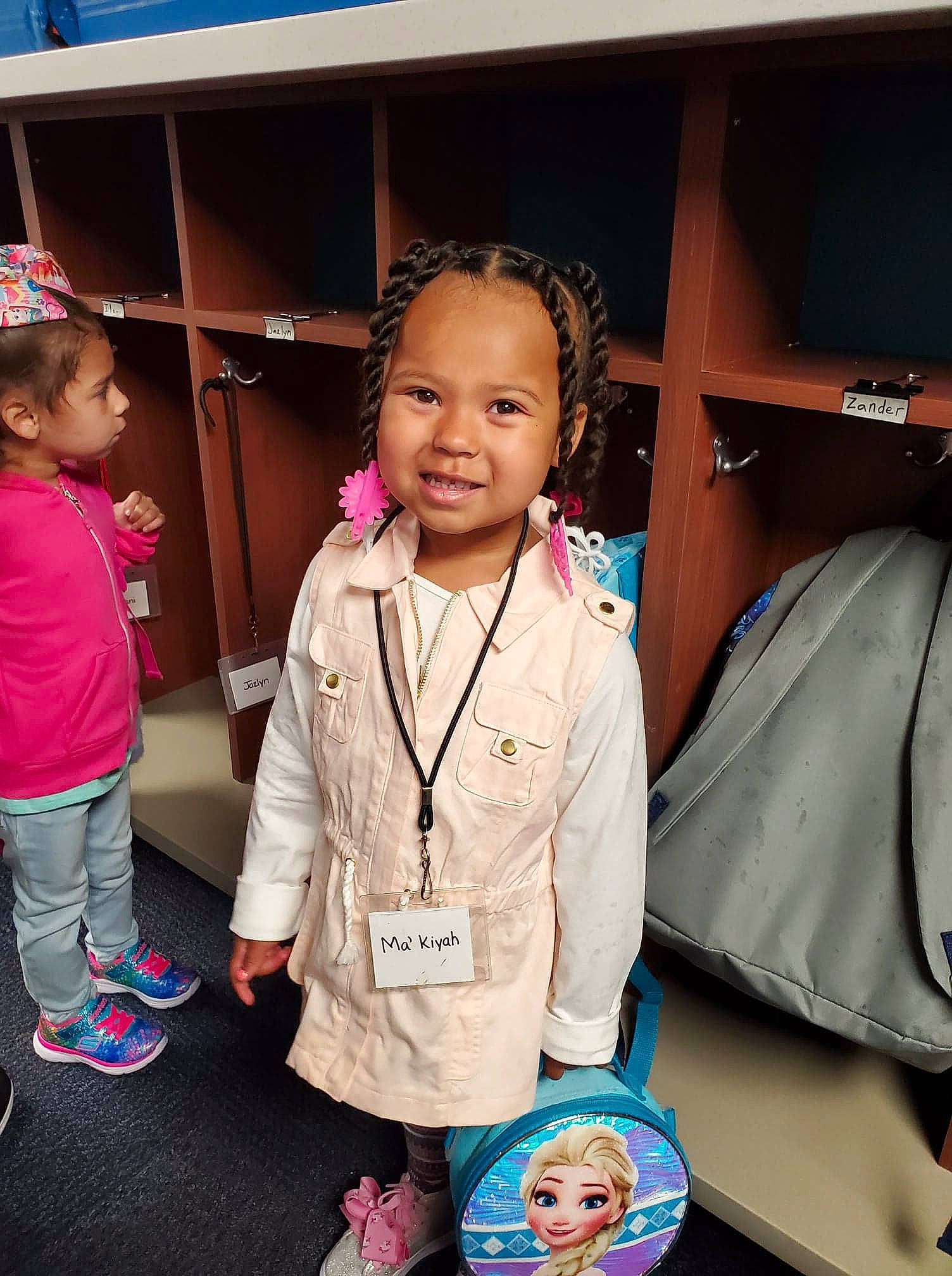 Ma'Kiyah is registered to the contest to win money with this photo: child, joy, outerwear, person, room, shoulder, skin, smile, style, t_shirt, toddler