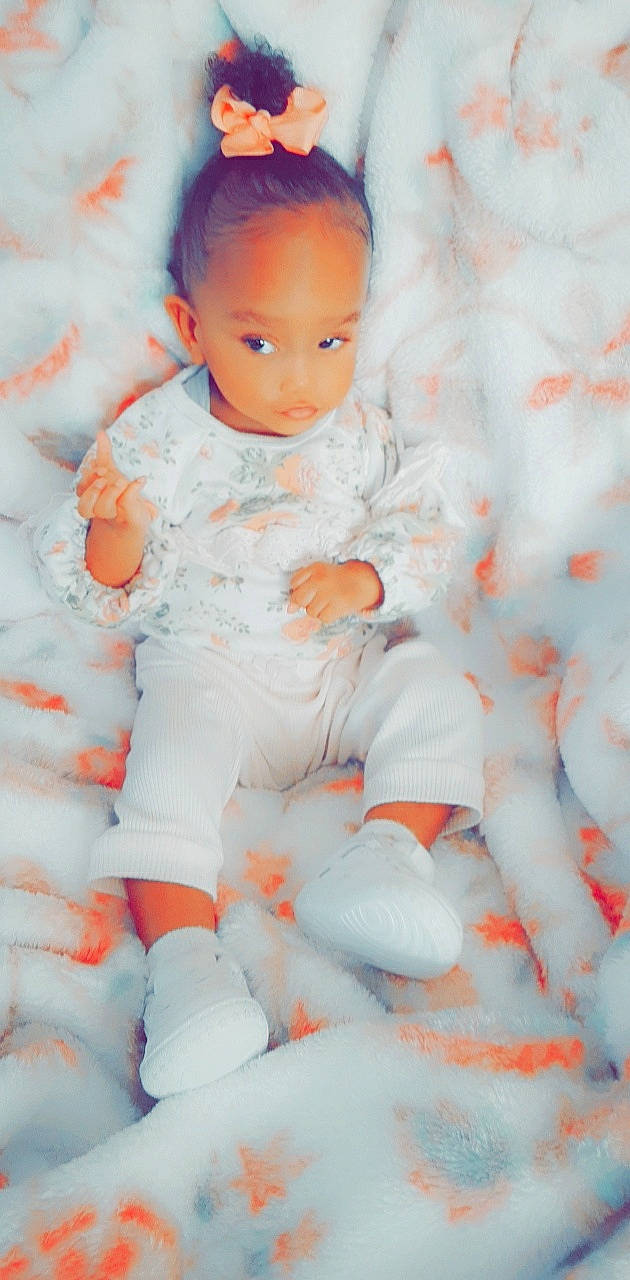 Michyra joined the competition — help win amazing prizes! baby, baby_toddler_clothing, cheek, child, finger, fun, happy, human_leg, orange, pattern, peach, person, pink, portrait_photography, sitting, sleeve, thigh, thumb, toddler, white