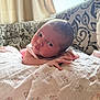 Isla joined the competition — help win amazing prizes! baby, infant, blanket, couch, curtains, face, hand, indoors, light, pattern, person, portrait, resting, soft, toddler, young, cute, expression, skin, window