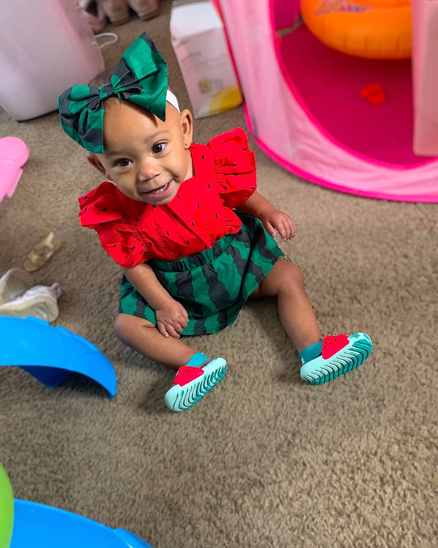 Asata is registered to the contest to win money with this photo: baby, baby_toddler_clothing, child, doll, flooring, fun, grass, happy, holiday, human_leg, leisure, magenta, person, pink, play, product, recreation, sock, stuffed_toy, toddler