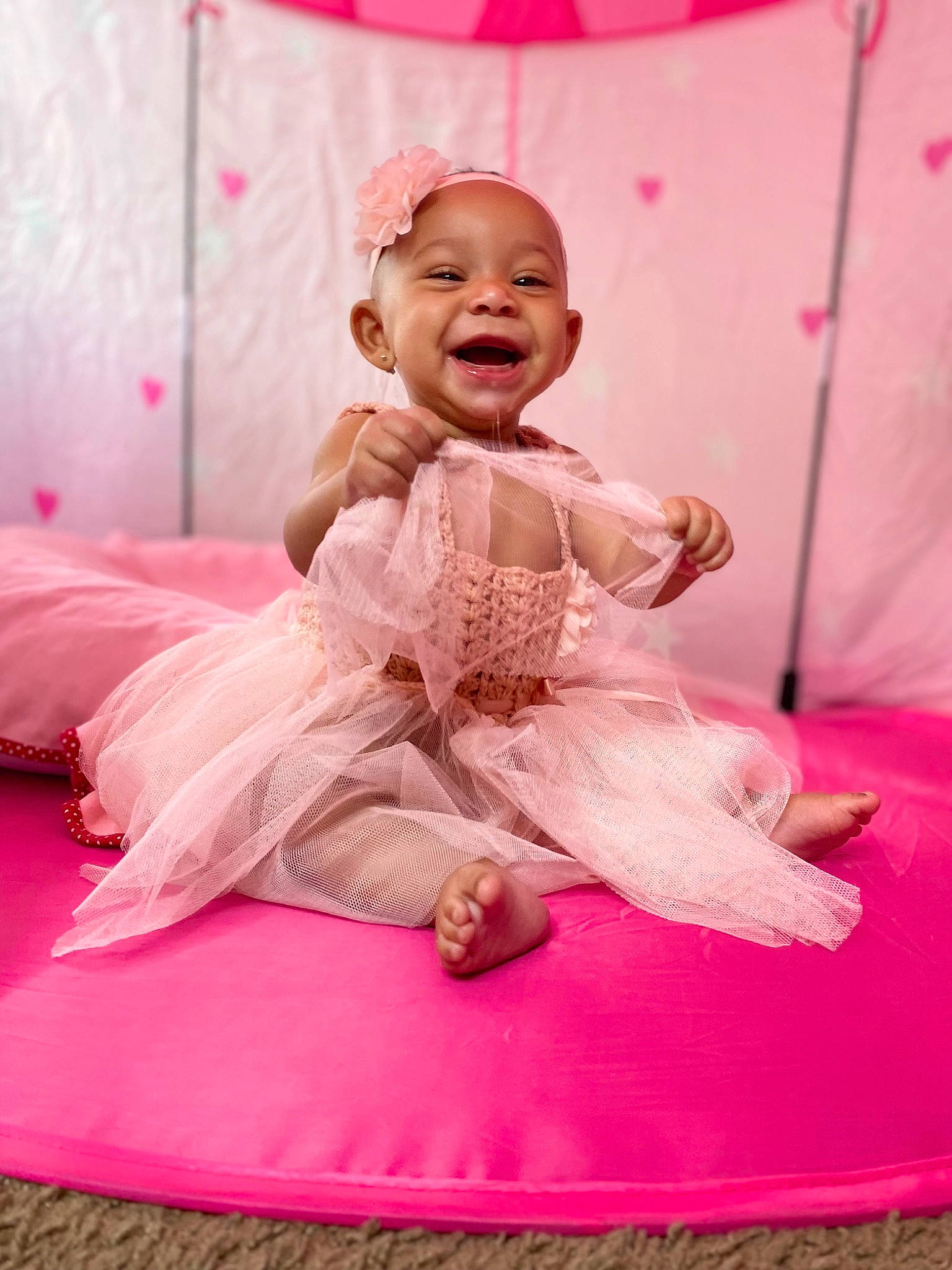 Asata joined the competition — help win amazing prizes! baby, baby_toddler_clothing, child, clothing, comfort, dress, flash_photography, fun, happy, magenta, peach, person, petal, pink, purple, ruffle, sitting, sleeve, smile, textile