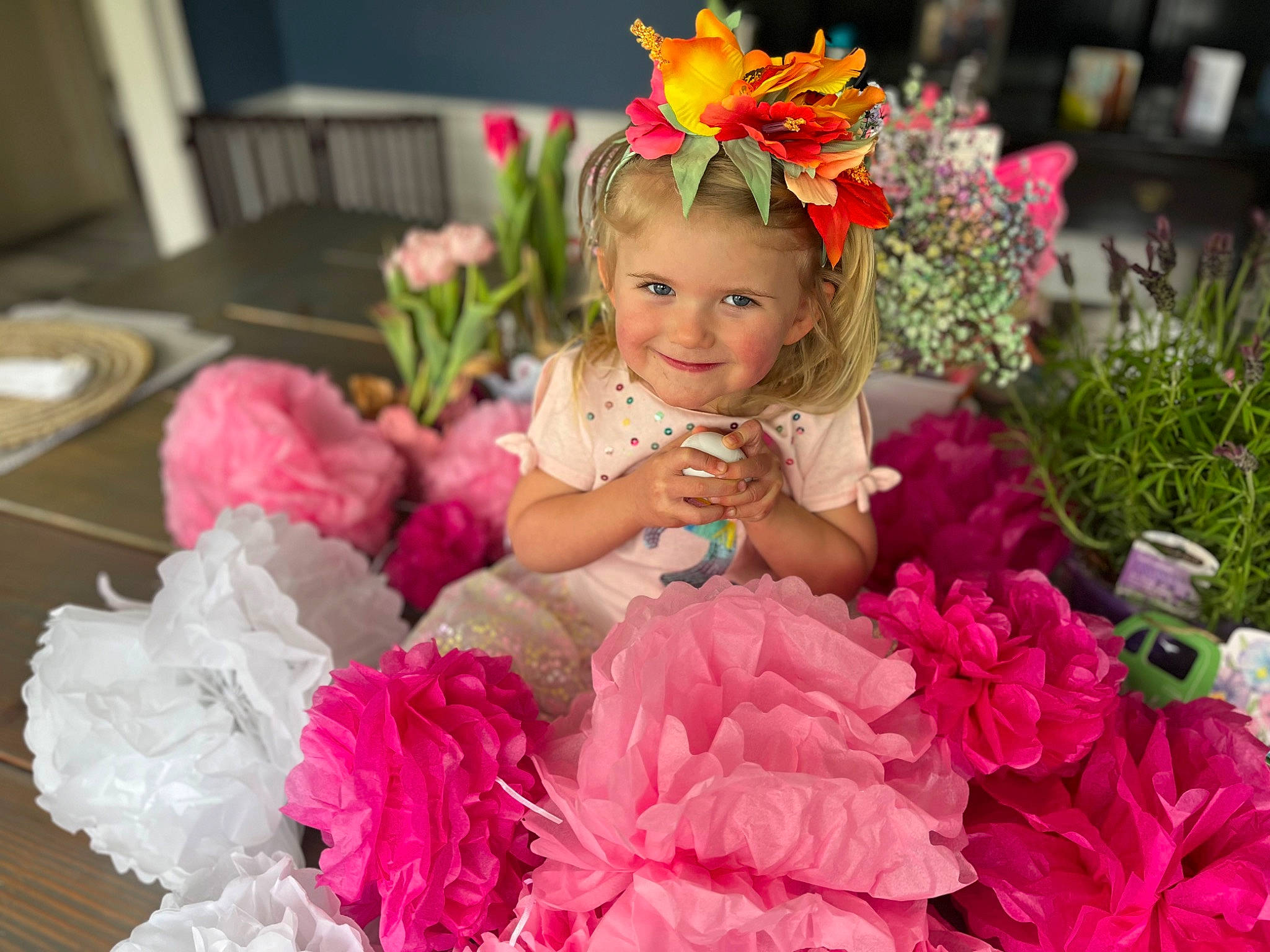 Quincy joined the competition — help win amazing prizes! baby_toddler_clothing, bouquet, child, cut_flowers, dress, event, facial_expression, flower, flower_arranging, fun, happy, headgear, headpiece, headwear, joy, magenta, person, petal, pink, plant