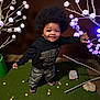 Messiah joined the competition — help win amazing prizes! afro, camouflage_pants, child, cute, dark_background, decorative_branches, fashion, green_turf, happy, hoodie, indoor, jordan, person, playful, posing, rock, smiling, sneakers, toddler, white_balls