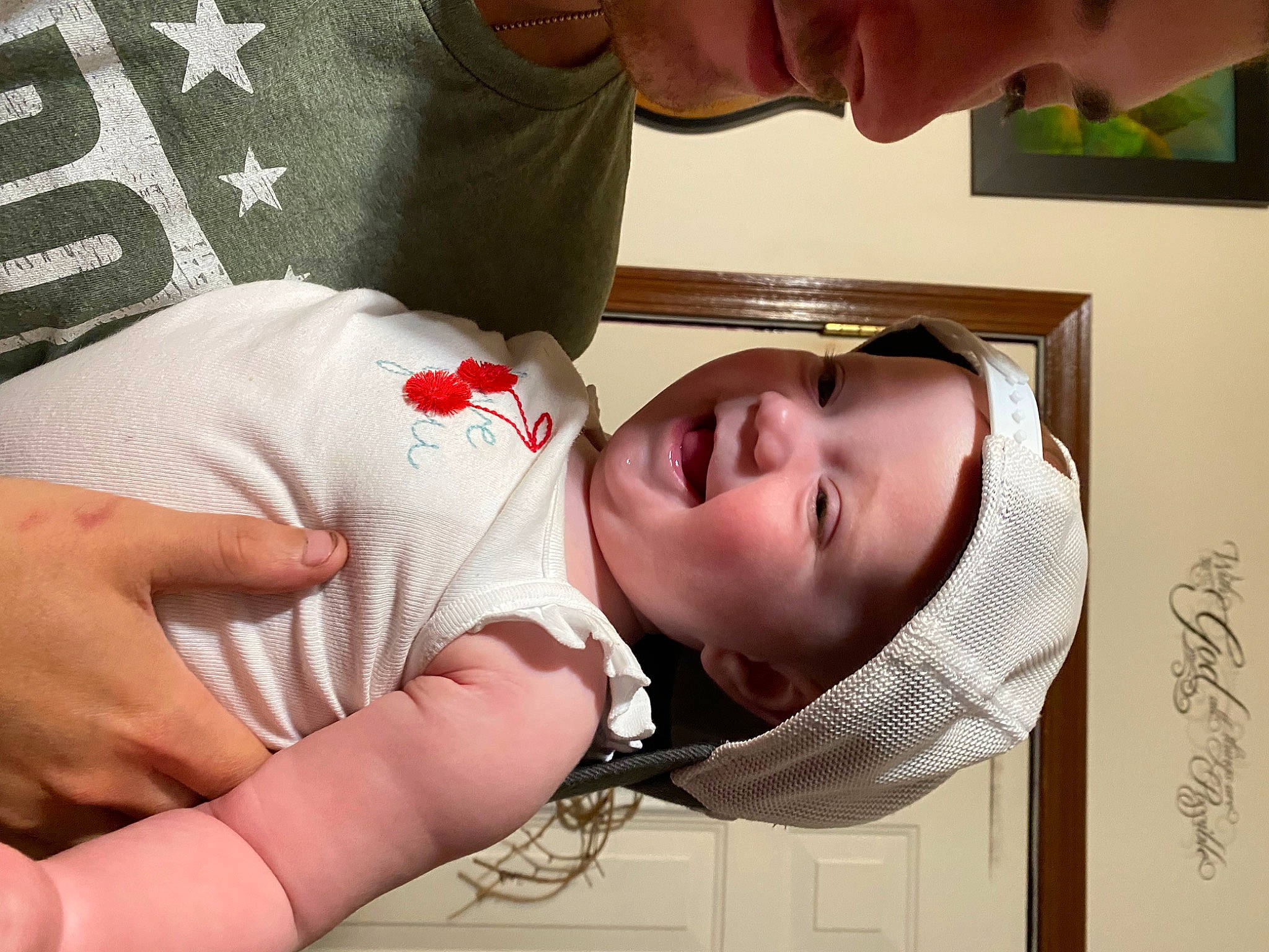 Legacy is registered to the contest to win money with this photo: arm, child, comfort, elbow, eye, eyelash, facial_expression, finger, gesture, glasses, hand, happy, headwear, lip, mouth, neck, nose, organ, person, plant