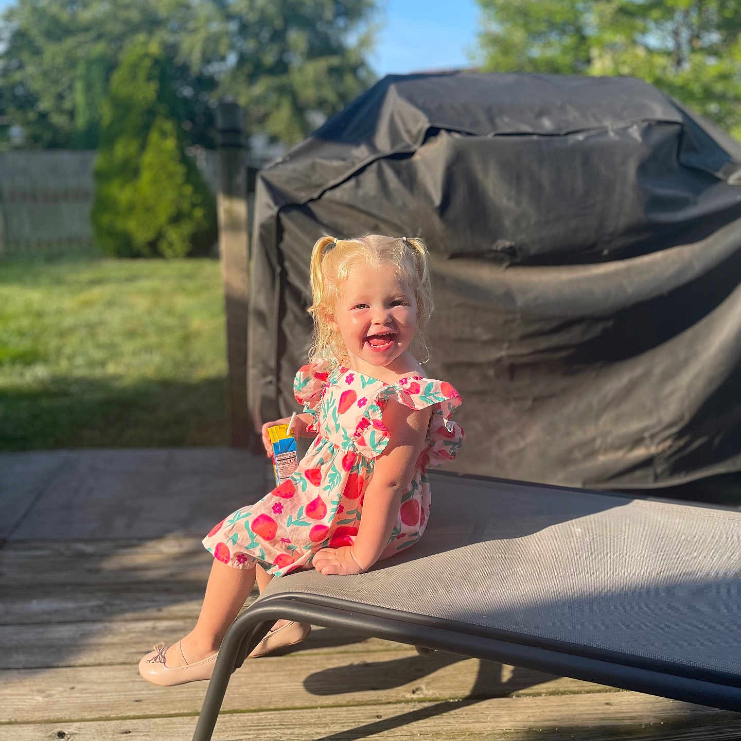 Maelynn is registered to the contest to win money with this photo: architecture, baby, backyard, building, child, face, female, furniture, girl, happy, head, nature, outdoors, person, photography, portrait, shelter, sitting, summer, yard