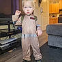 toddler, child, costume, ghostbusters, venkman, indoor, living_room, carpet, television, couch, door, kitchen, shoes, floor, person, young_child, standing, expression, hair, clothing