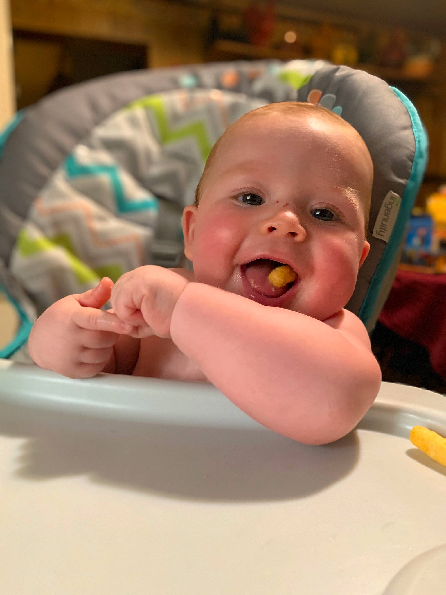 William joined the competition — help win amazing prizes! baby, baby_products, baby_toddler_clothing, bib, chair, cheek, child, comfort, eating, event, facial_expression, fun, happy, mouth, person, room, sitting, skin, tableware, thumb