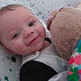 Jaxson is registered to the contest to win money with this photo: baby, bed, bedroom, blanket, bodypart, couch, cradle, crib, cushion, face, finger, furniture, hand, head, homedecor, indoors, infantbed, linen, newborn, nursery