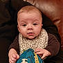 Jaxson joined the competition — help win amazing prizes! baby, ball, baseball, baseballglove, bib, blanket, bodypart, chair, clothing, couch, cushion, face, finger, footwear, frown, furniture, glove, hand, hat, head