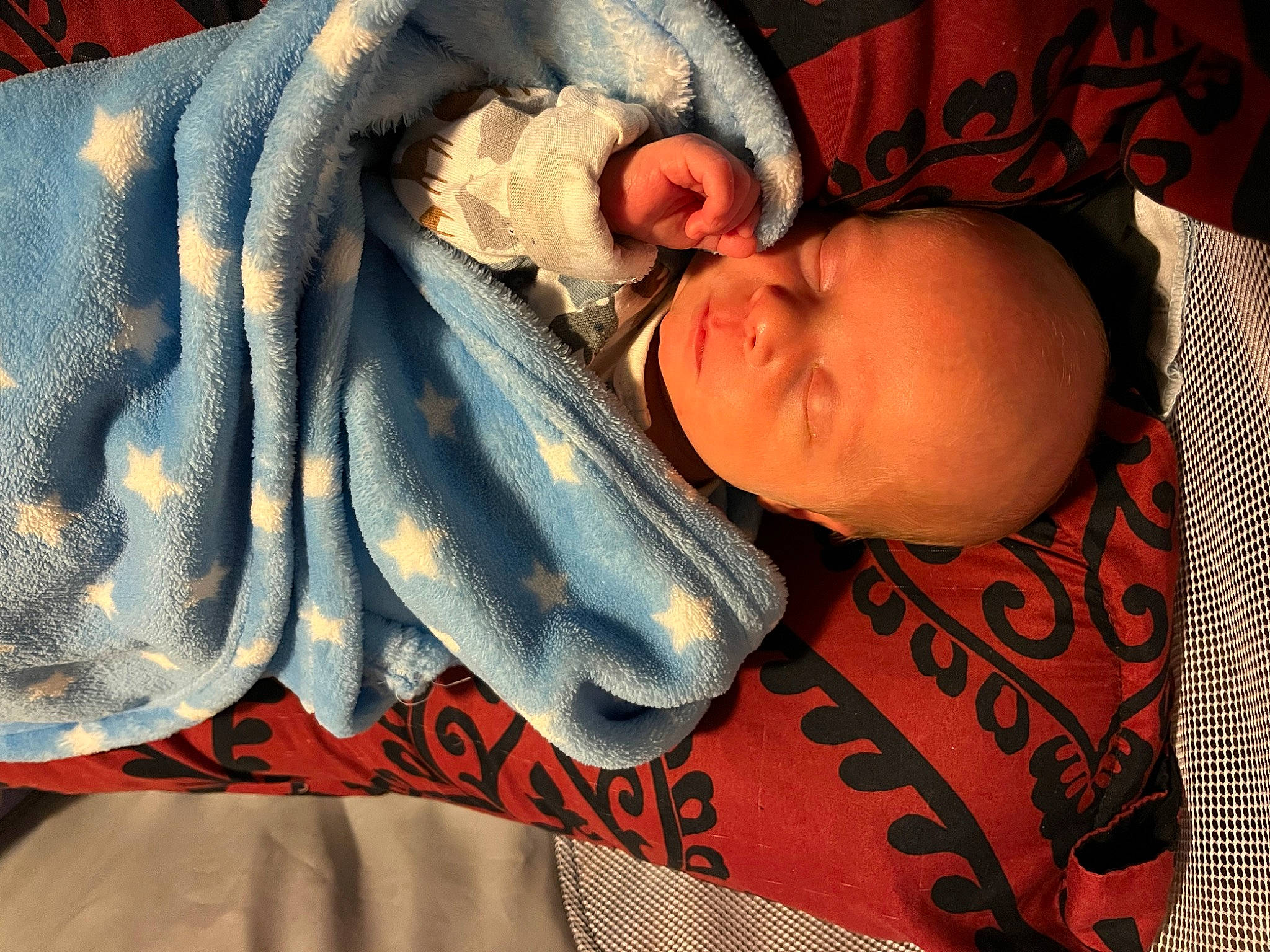 Eric is registered to the contest to win money with this photo: baby, baby_products, baby_sleeping, baby_toddler_clothing, bed, bedding, bedtime, child, comfort, electric_blue, eyelash, finger, fur, linens, nap, person, room, thread, toddler, wool