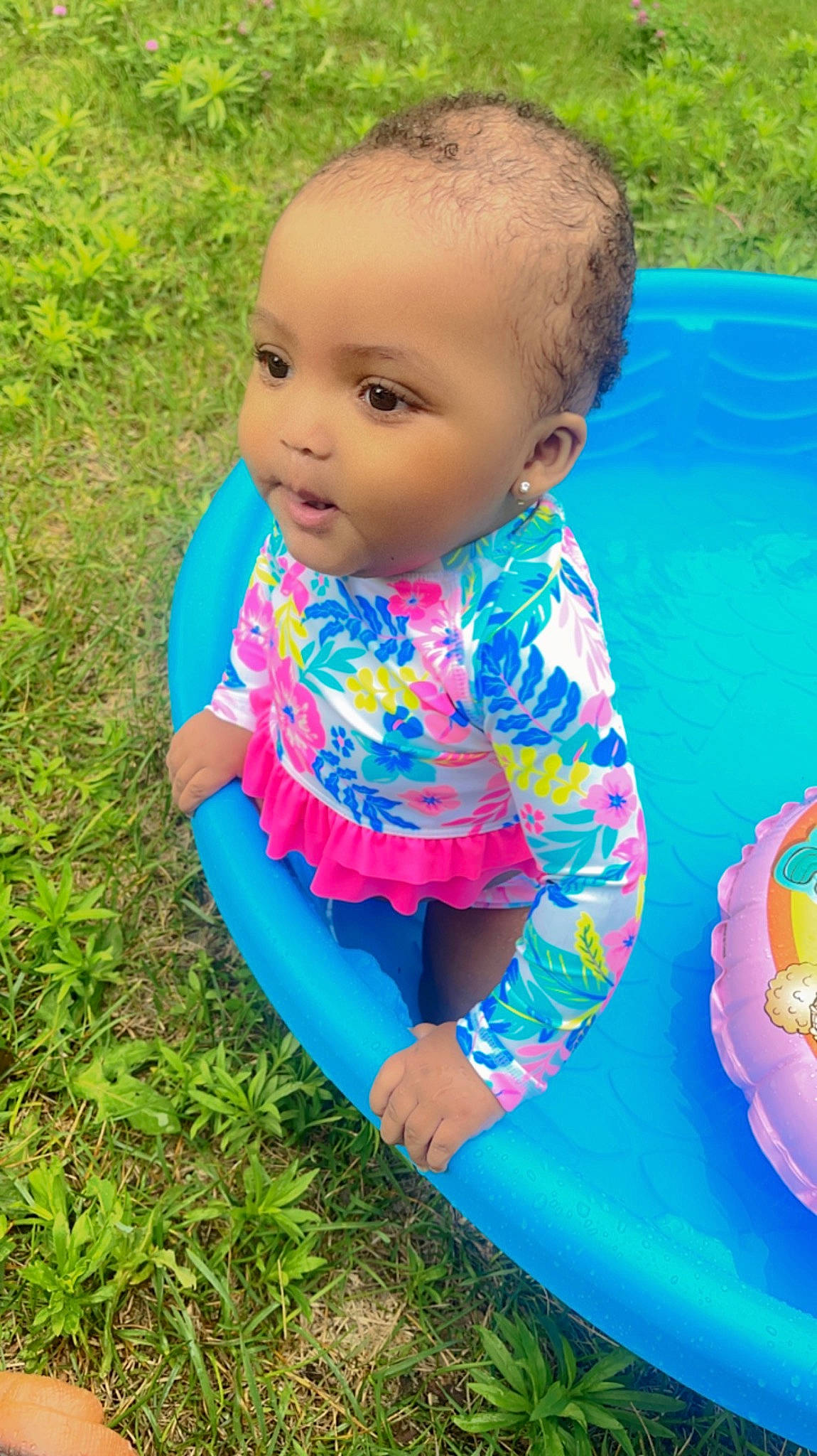 Sahani joined the competition — help win amazing prizes! azure, baby, baby_products, baby_toddler_clothing, blue, child, electric_blue, fun, grass, happy, leisure, people_in_nature, person, pink, plant, play, recreation, sitting, swimming_pool, toddler
