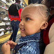 Sahani is registered to the contest to win money with this photo: adult, boy, child, clothing, face, female, footwear, hair, hat, head, jeans, male, pants, person, photography, portrait, shoe, shoeshop, shop, woman