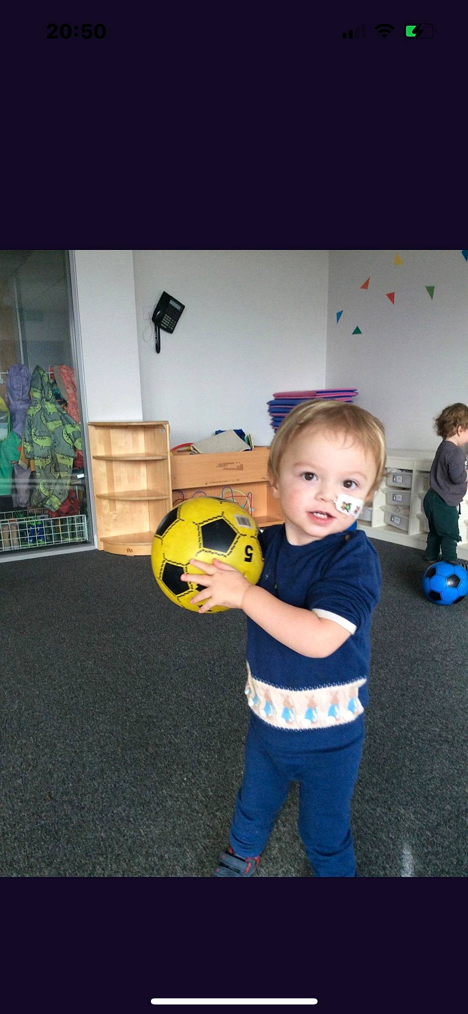 Codey joined the competition — help win amazing prizes! baby, baby_toddler_clothing, ball, child, flooring, football, fun, grass, happy, leisure, person, player, room, smile, soccer, soccer_ball, sports_equipment, sports_toy, t_shirt, toddler